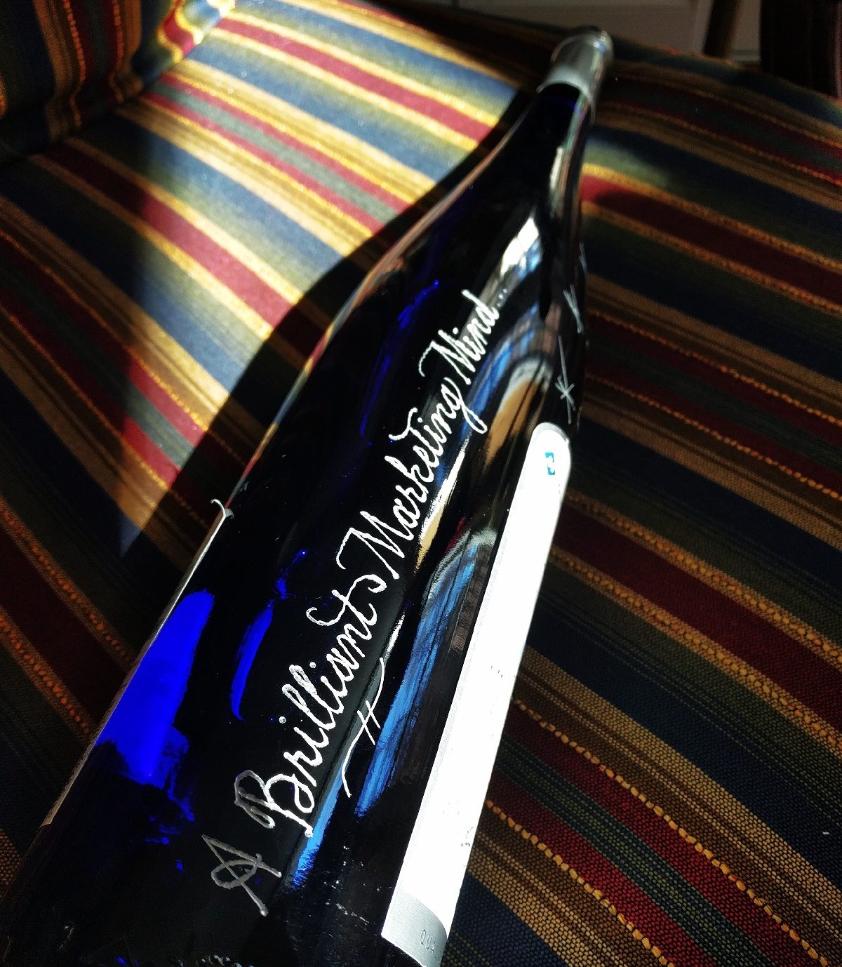 An engraved wine bottle makes a memorable corporate gift for any executive.